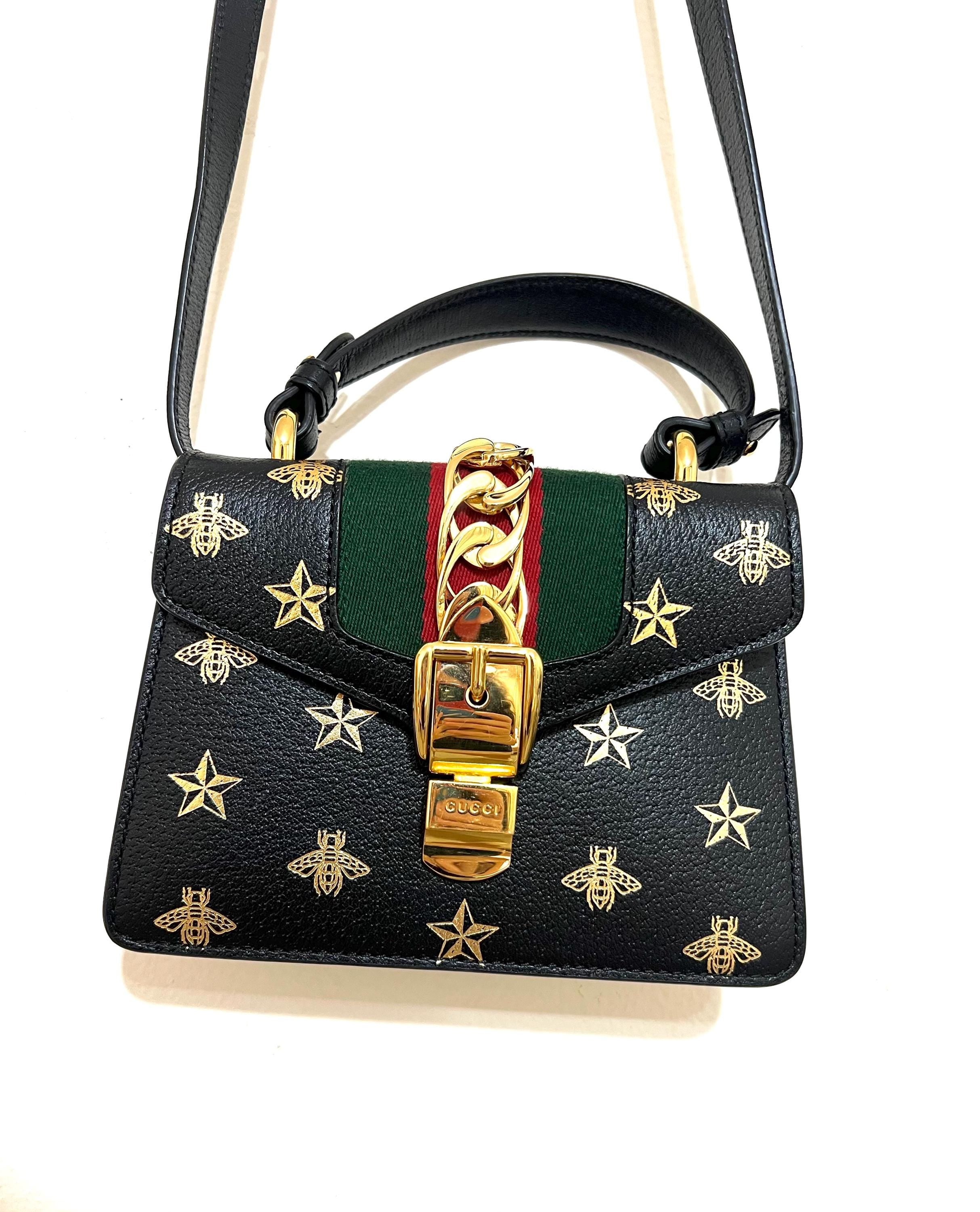 Authentic Gucci Sylvie Bee Star Leather Shoulder Bag - Black with Gold Bee & Star Print
