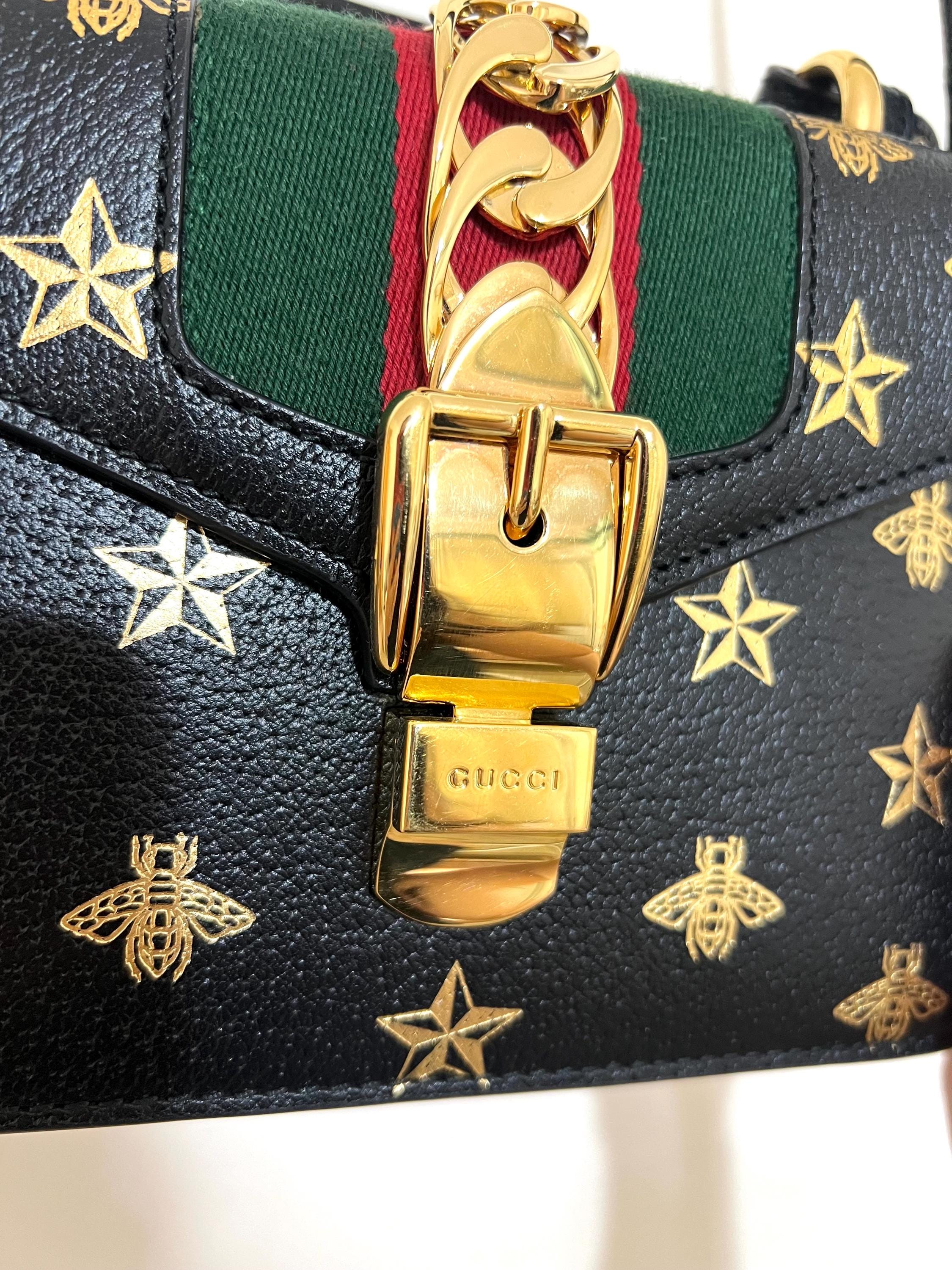 Authentic Gucci Sylvie Bee Star Leather Shoulder Bag - Black with Gold Bee & Star Print