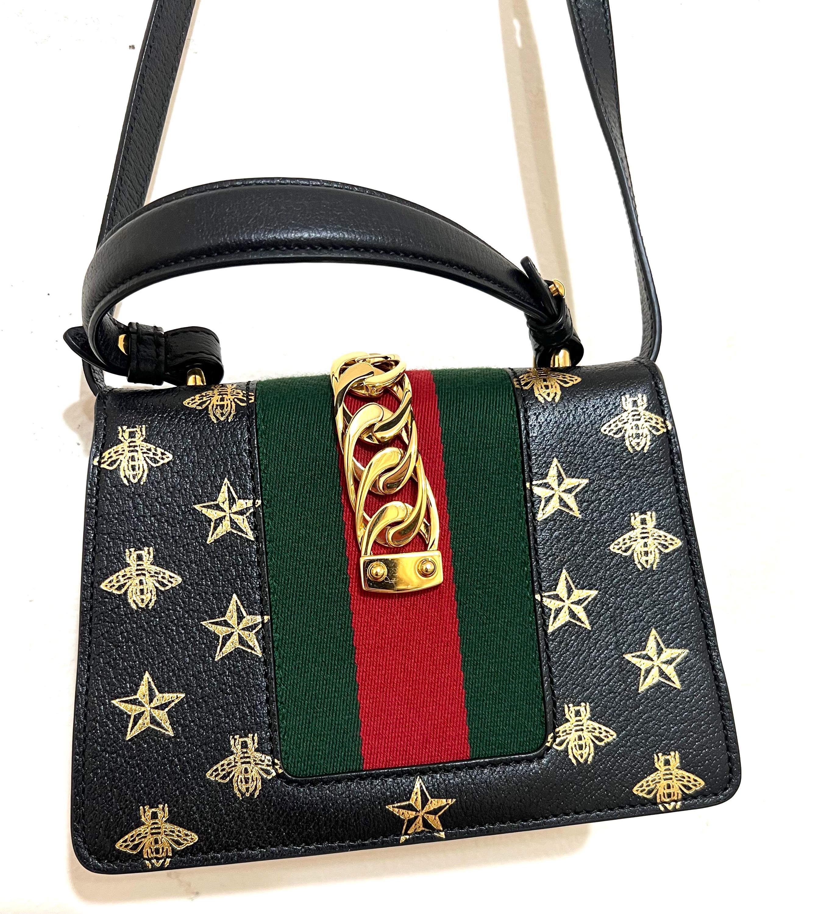 Authentic Gucci Sylvie Bee Star Leather Shoulder Bag - Black with Gold Bee & Star Print